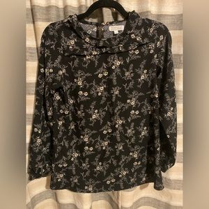 Black with white flowered shirt